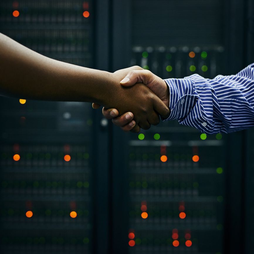 handshake between company employee and customer