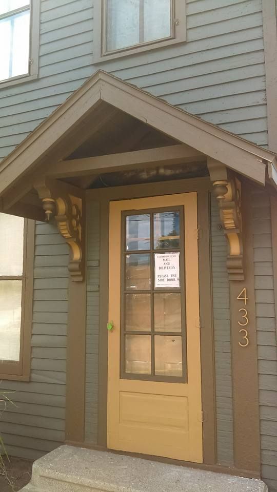 The front door of a building with the number 2334 on it