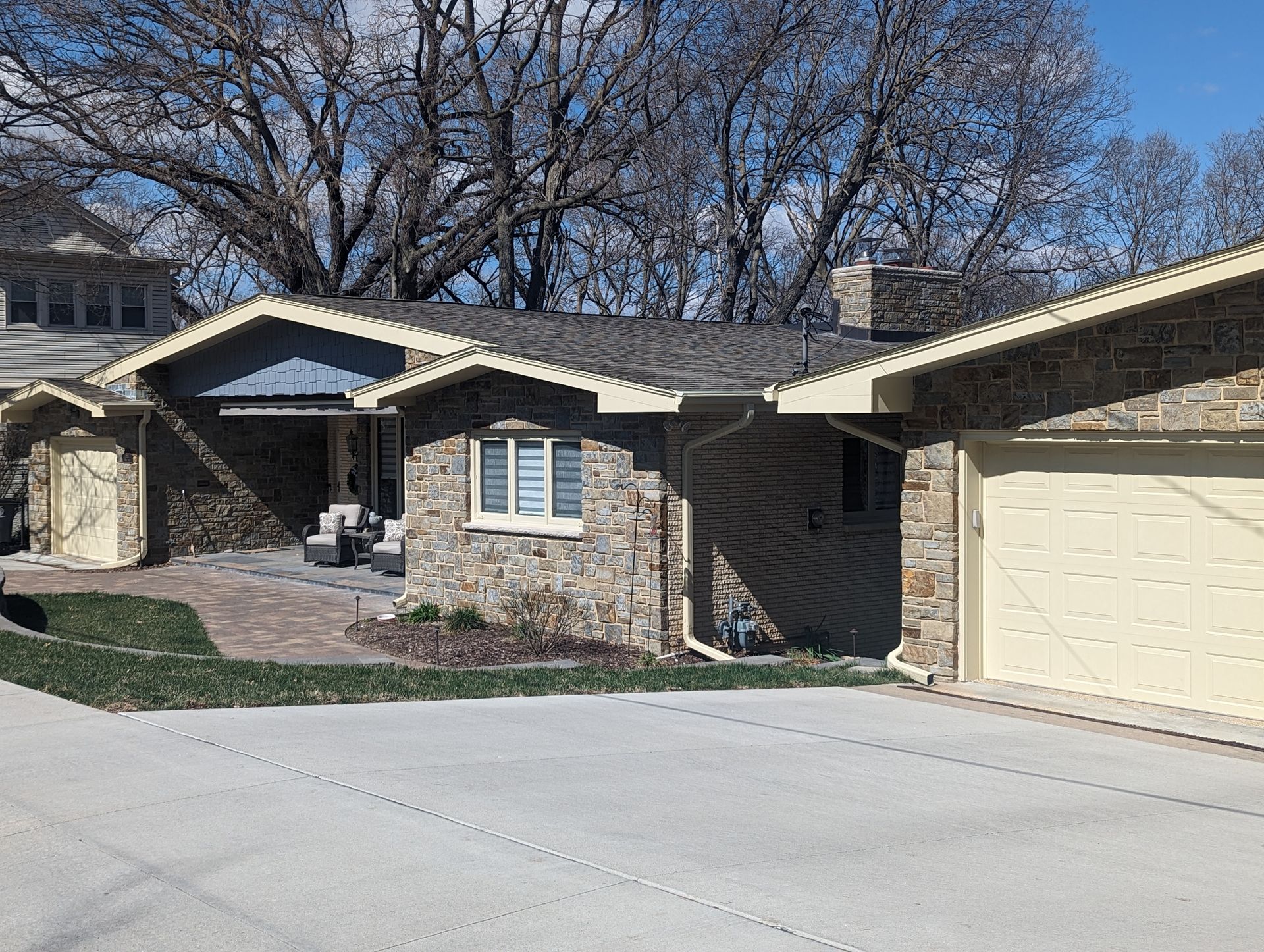 On this home in the Forest Drive Neighborhood in Council Bluffs , Iowa , we stripped off the old split face brick and installed a new stone façade. 