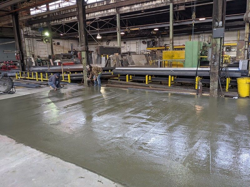 Pouring- Concrete-Commercial-Shop-Floor-Puritan-Manufacturing-Omaha-Nebraska