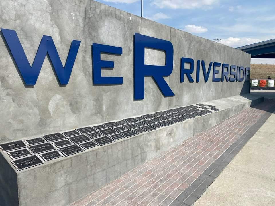 Job location was in Oakland, Iowa for Riverside School. 
We had to grind down and attempt to smooth out the poured concrete wall. Then we applied galvanized wire lath and 3 coats of traditional stucco and a knock down finish coat.