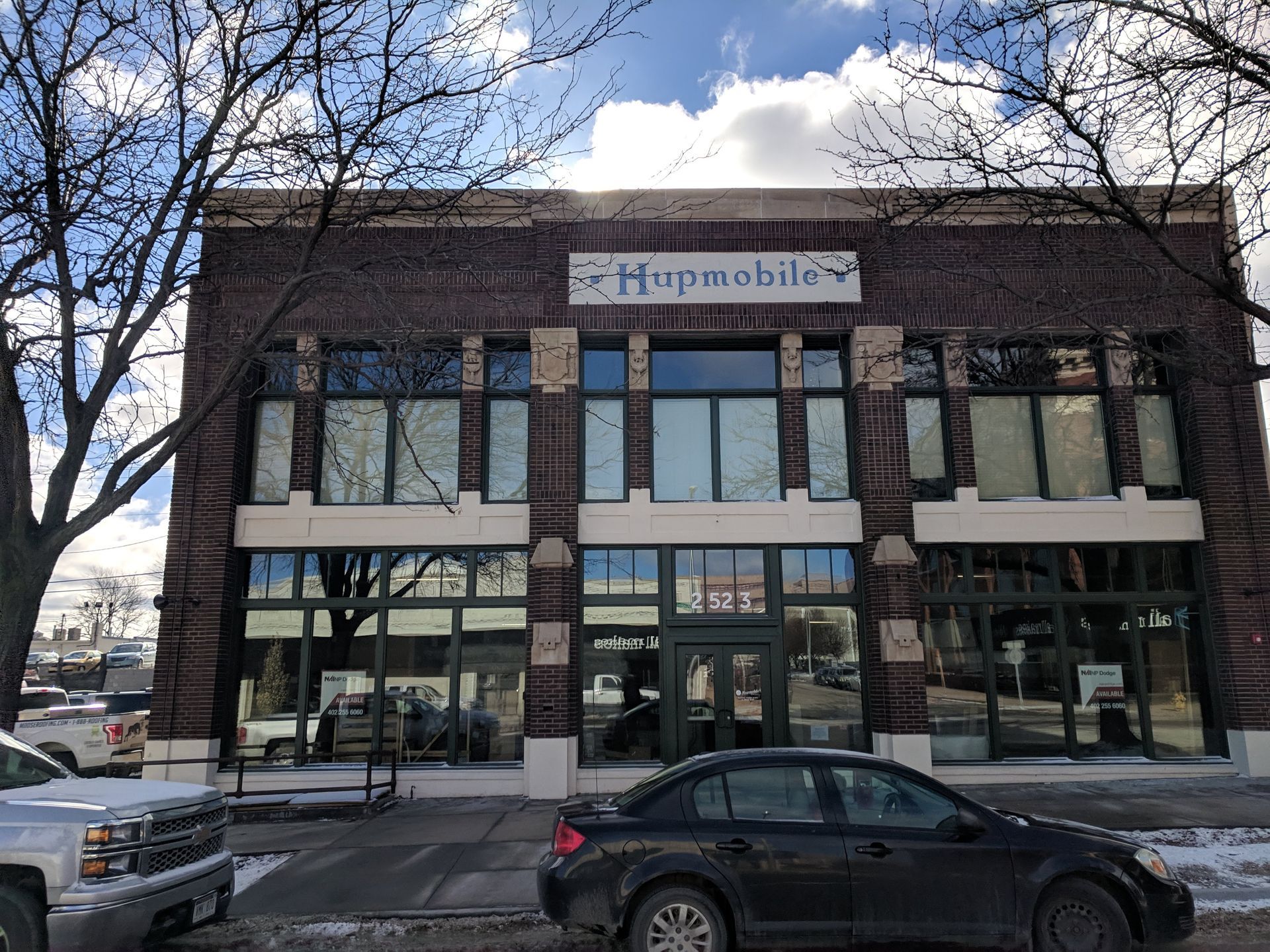 We completed a masonry restoration job on this historic building in Omaha, Nebraska. It is the Humpmobile building built in 1917 . It is located in Omaha's historic Auto row . We had to clean all of the masonry on the  building. Then we had to grind out all the bad mortar joints and tuck-point with color matching mortar. We also had to replace any damaged brick with salvaged brick that we supplied that matched. Then we had to fix the tile sign at the top center of the building. We also installed masonry anchors on the top section of the front of the building. 