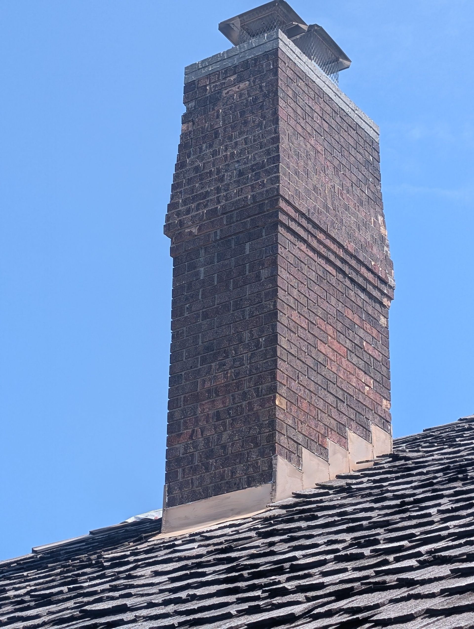 Old crumbling chimney in Regency Omaha, Nebraska
