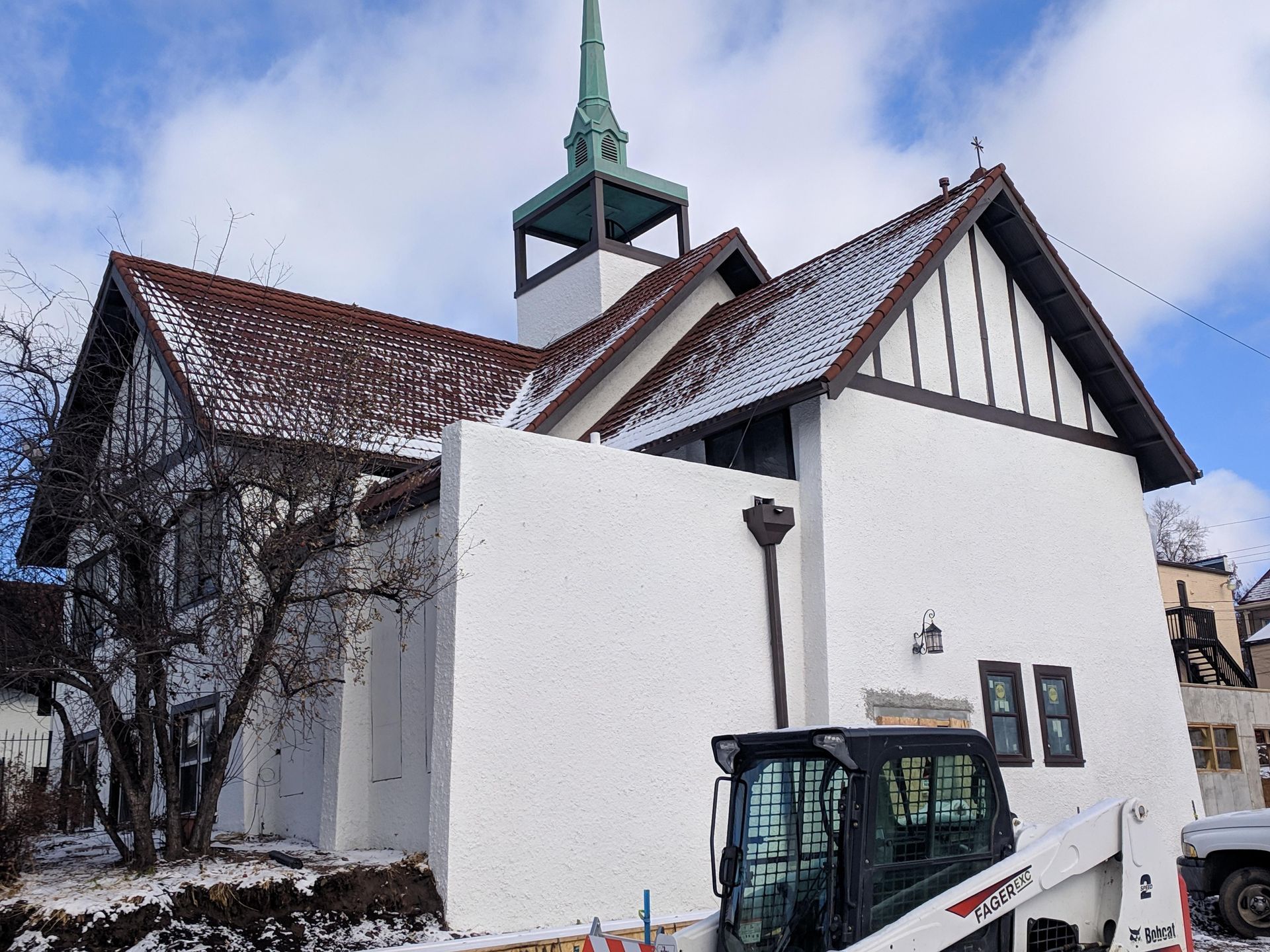 St. Barnabas Catholic Church Omaha, Nebraska . Traditional Stucco work  on new addition on church . We blended the new stucco into the old stucco giving the look that it has always been part of the church.