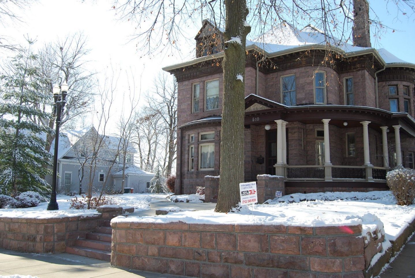 Custom Stone work on stone stair entries and stone retaining wall 