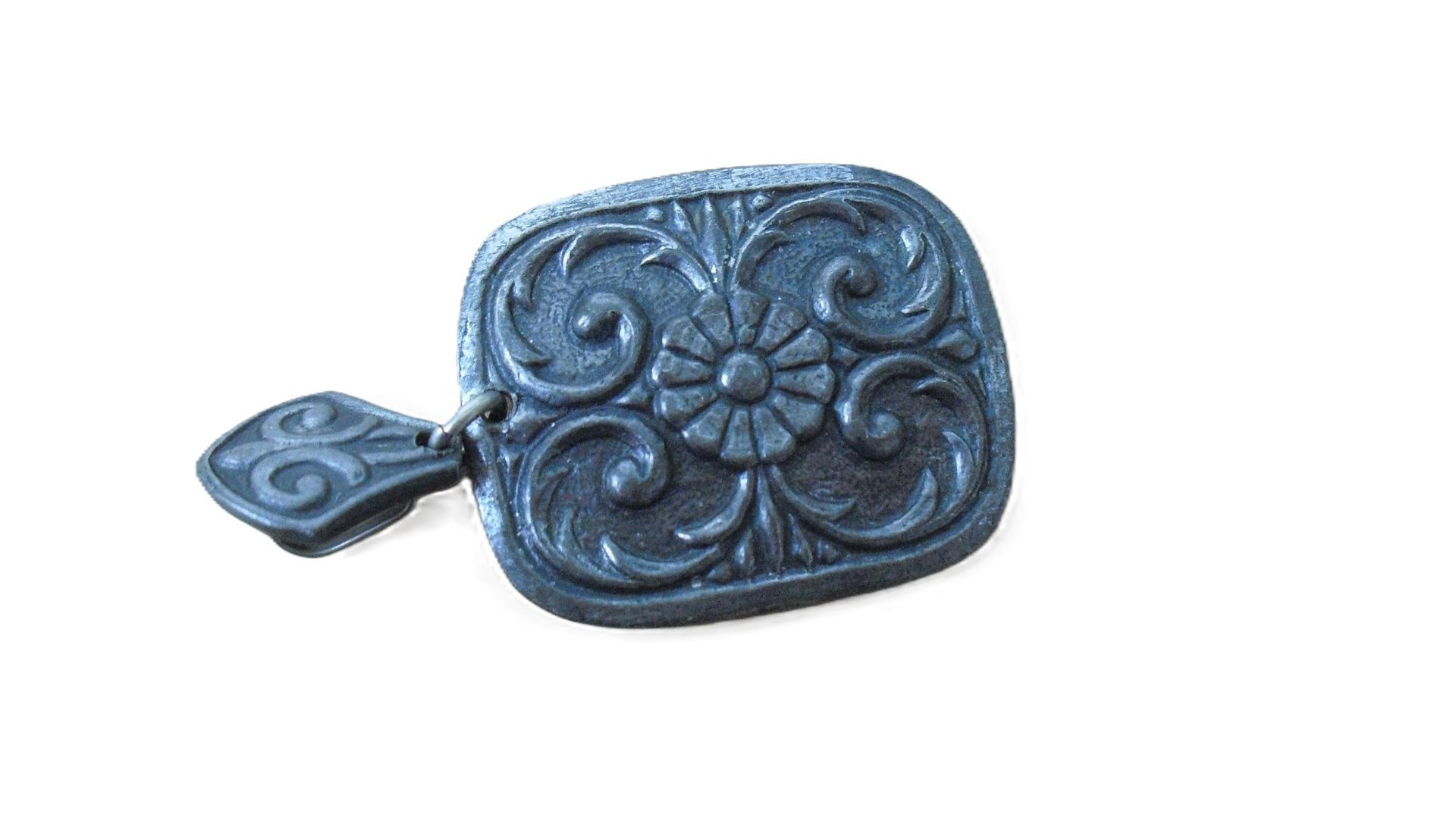 O.B.I. Tinn hanger