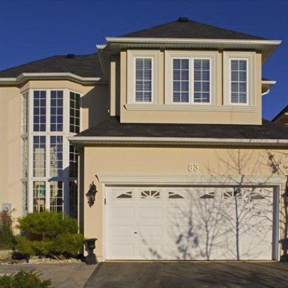 New Home Build — Light Yellow House With Garage in Seattle, WA