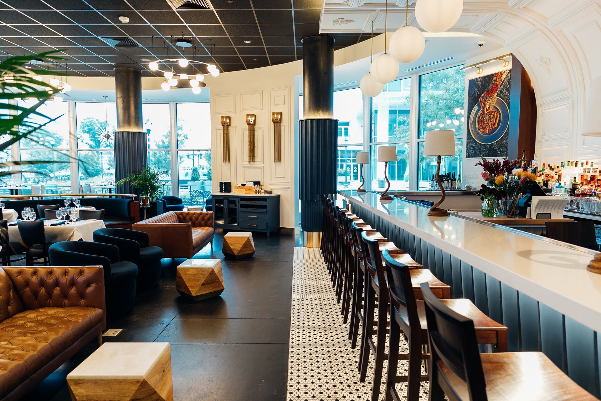 luce secondo restaurant with a long bar and tables and chairs