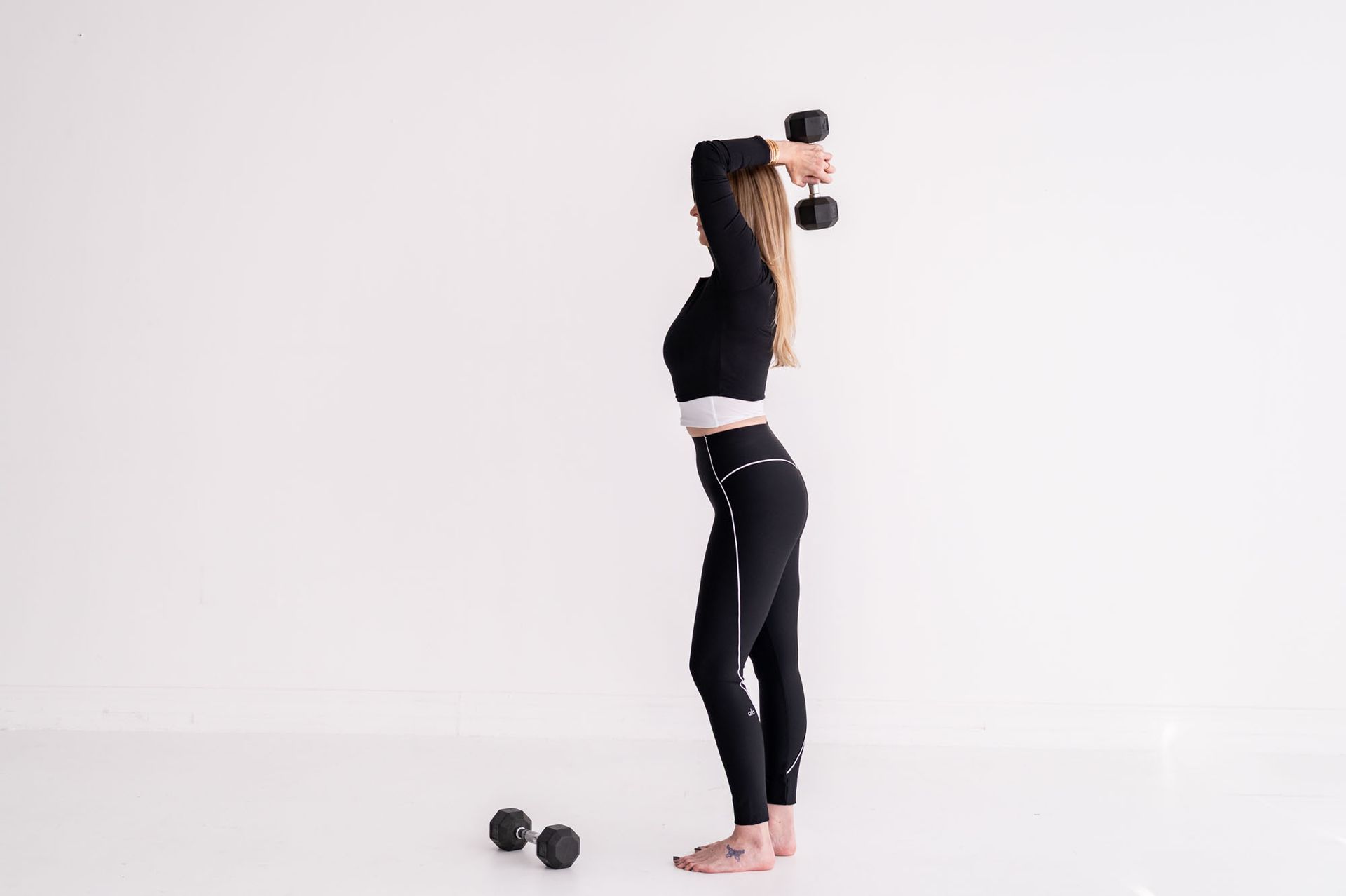 Overhead tricep extension with dumbbell.