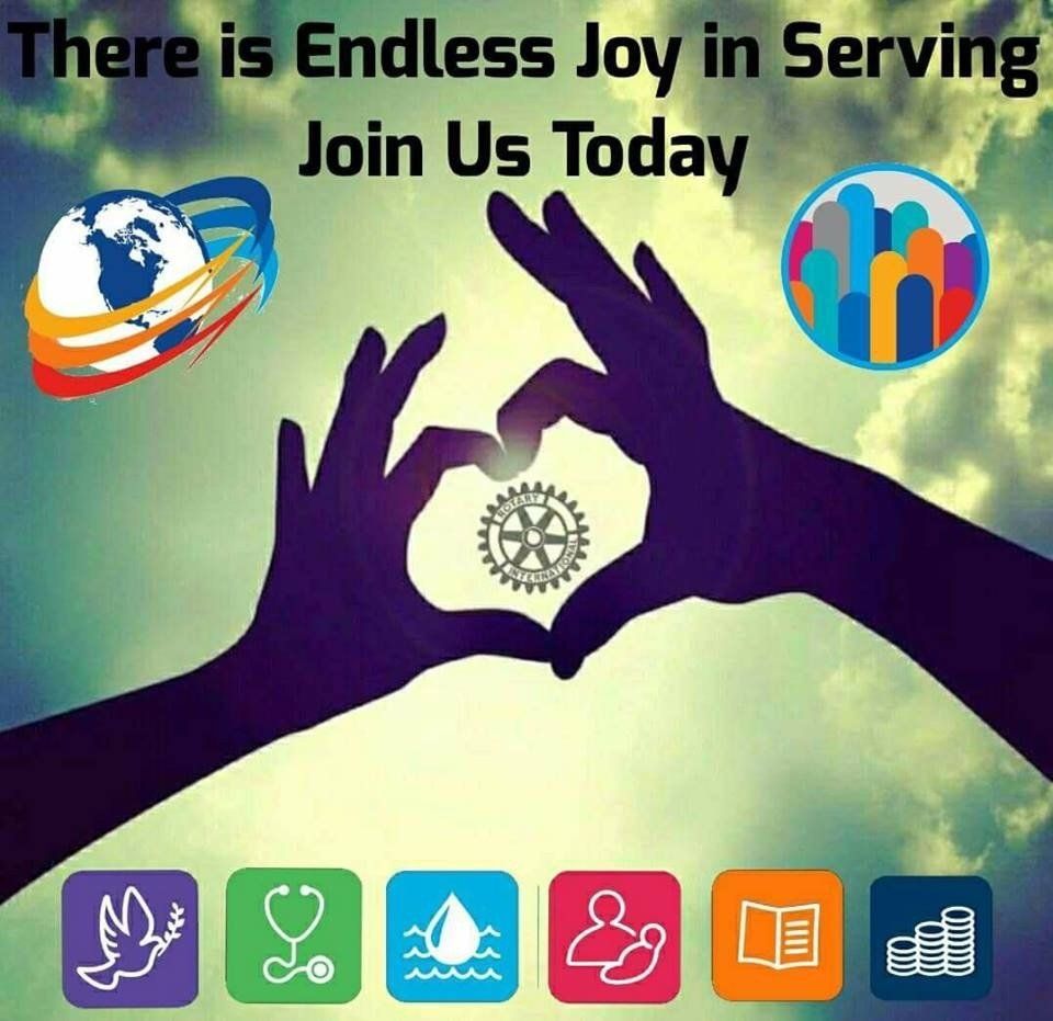 Hands forming a heart around Rotary wheel, with text 