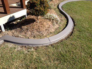 grey round kerb