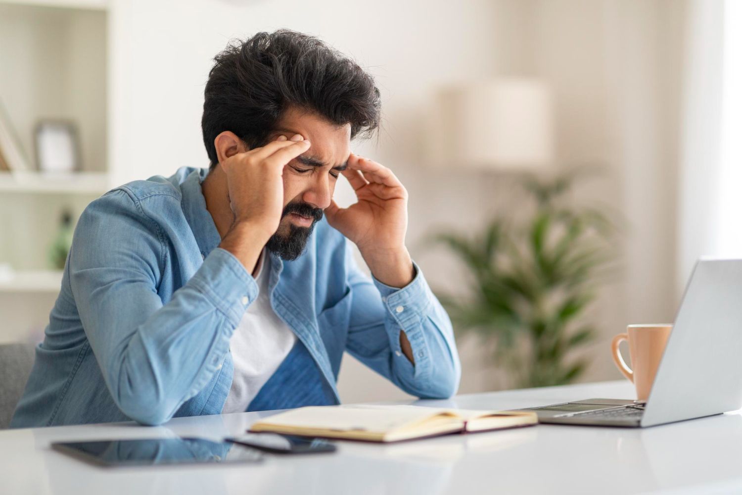 man is experiencing fatigue