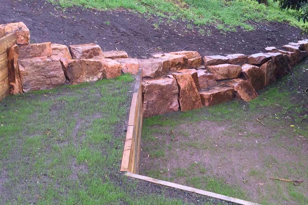 rock and wood retaining wall
