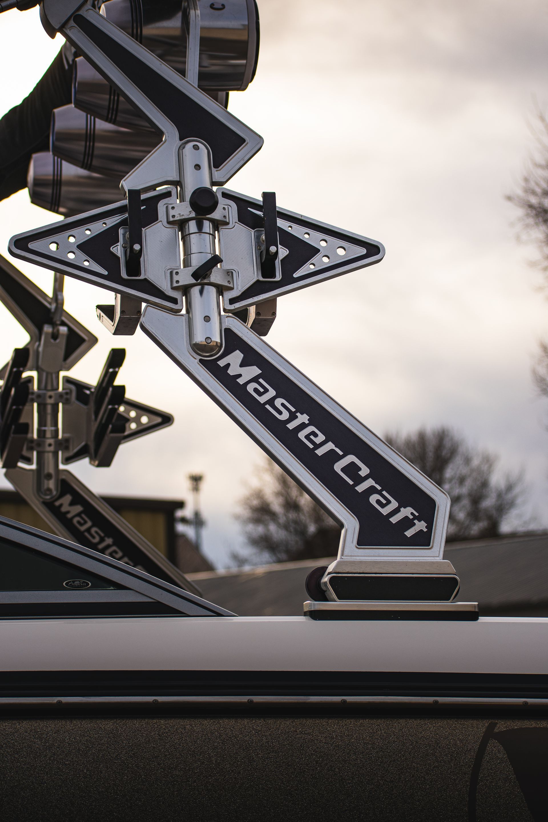 Close-up of a MasterCraft wakeboard tower on a boat. Silver and black design with