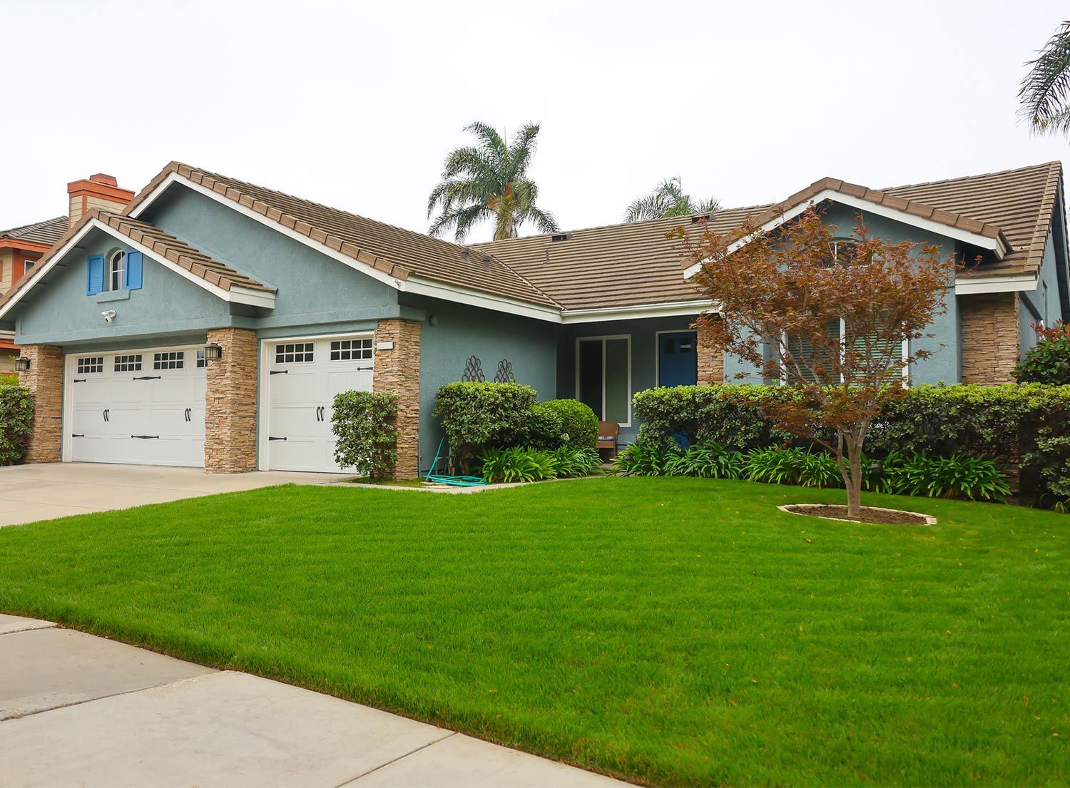 House with lush green lawn
