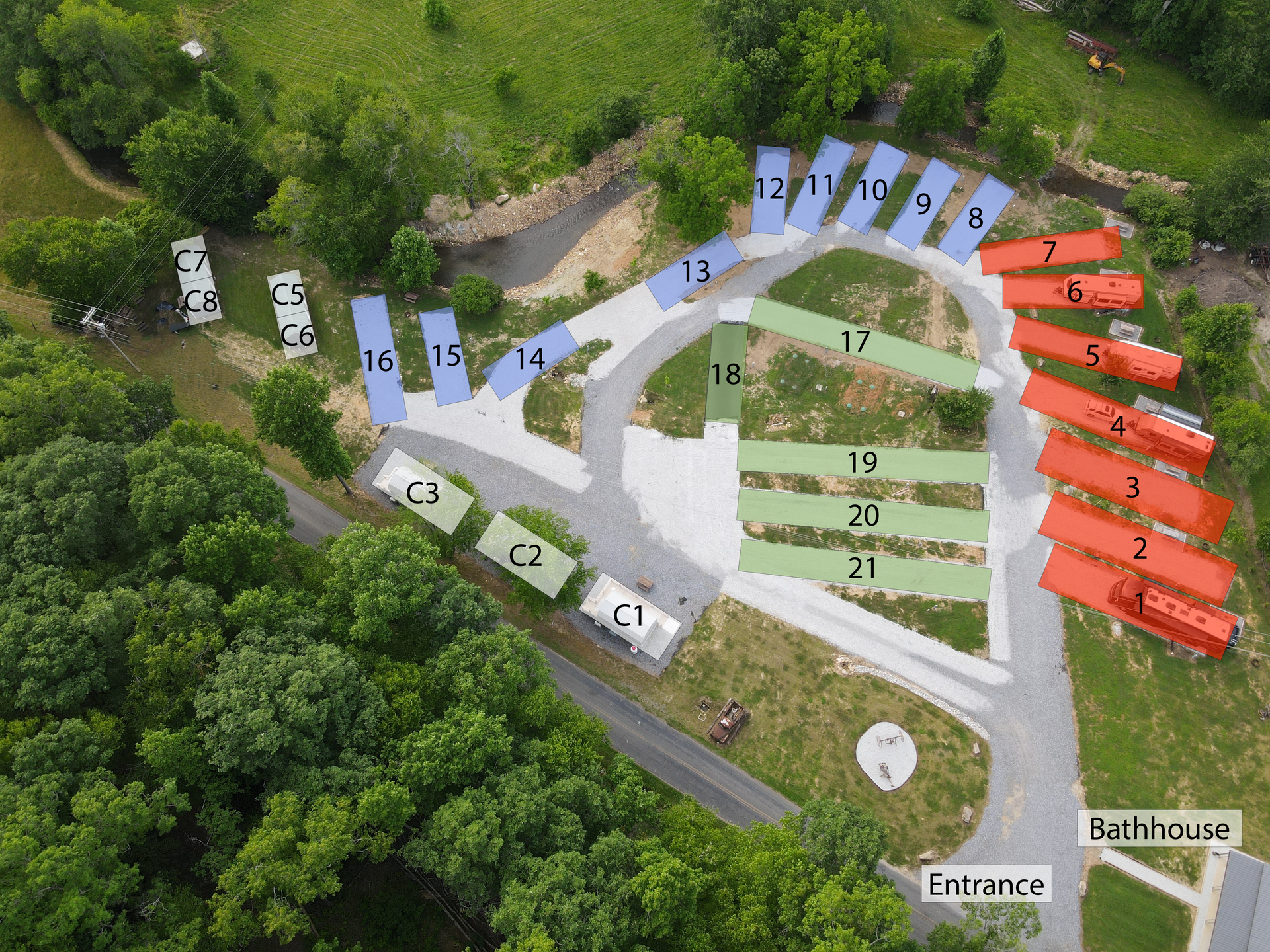 An aerial view of a campground with lots of trees