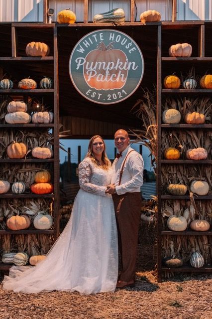 A maze made out of hay bales on a lush green field.
