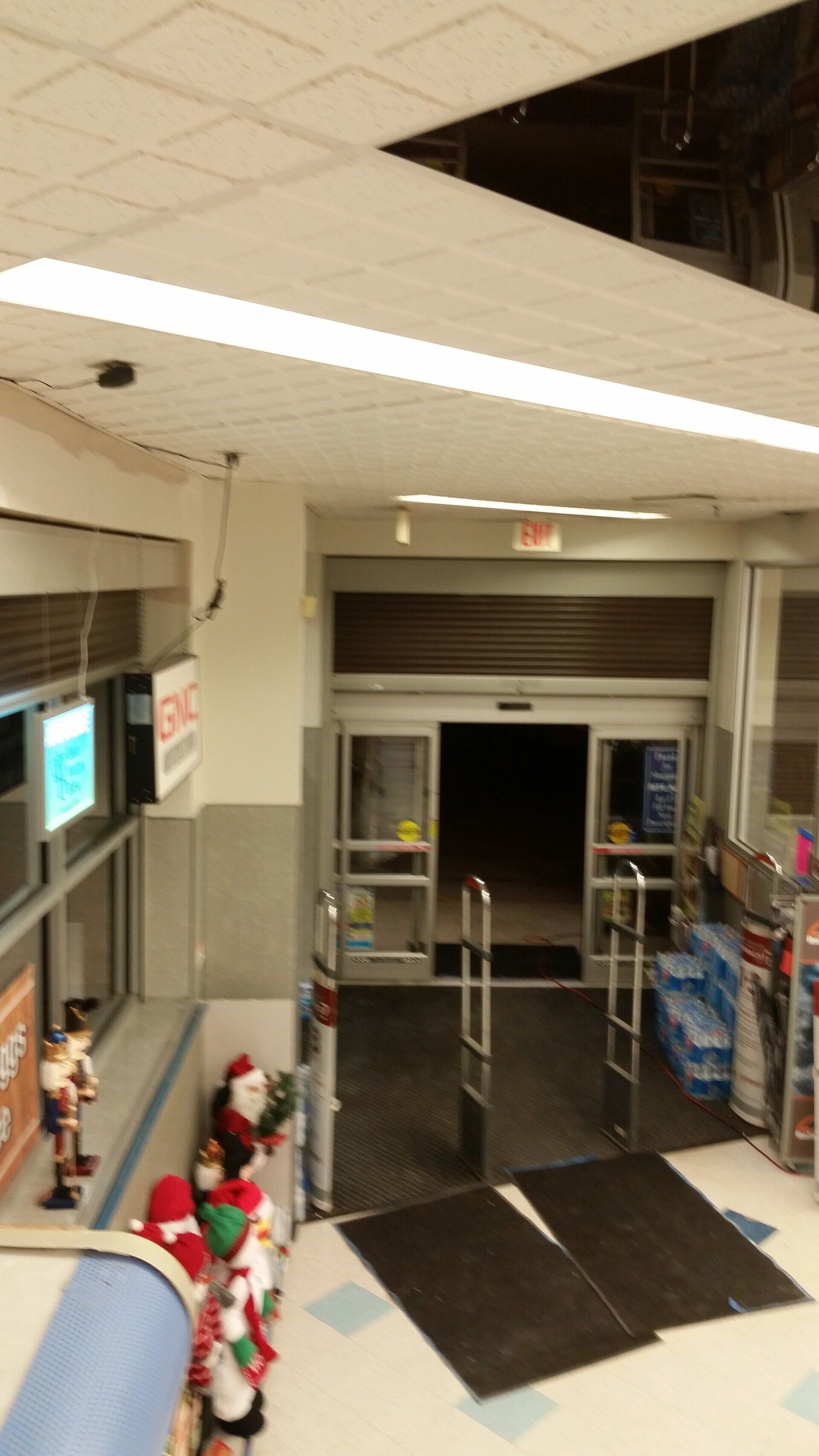 A store with a sign that says ' exit ' on it