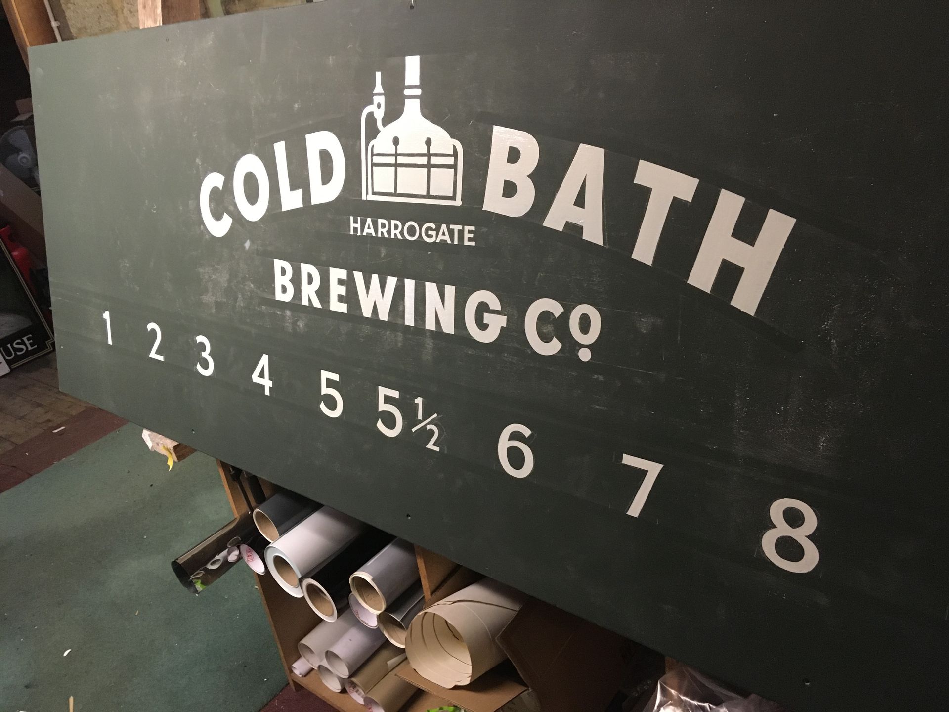 A sign that says cold bath brewing co on it