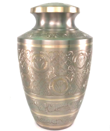 A silver vase with a floral design on it