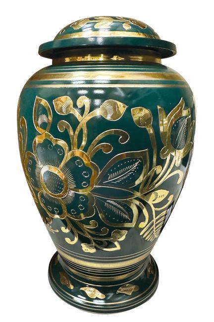 A green vase with gold flowers on it on a white background.