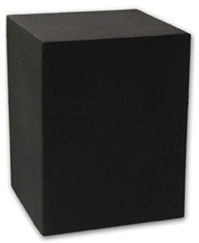 A black cube is sitting on a white surface