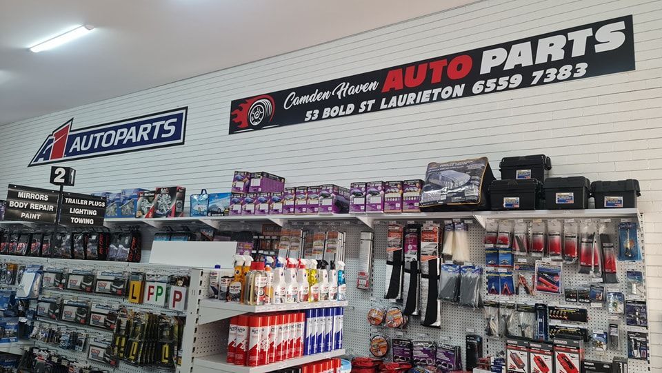 A Store Filled With Lots Of Car Parts And A Sign That Says Auto Parts — Camden Haven Tyre & Brake Centre In Laurieton, NSW