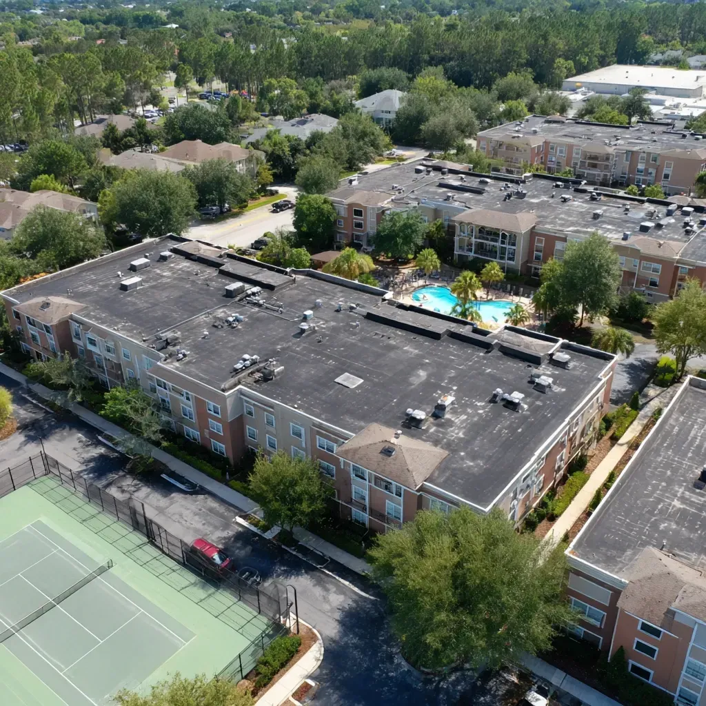 Monthly commercial roof checkups Brandon FL targeting early damage signs, loose fasteners, and soft decking under membrane.