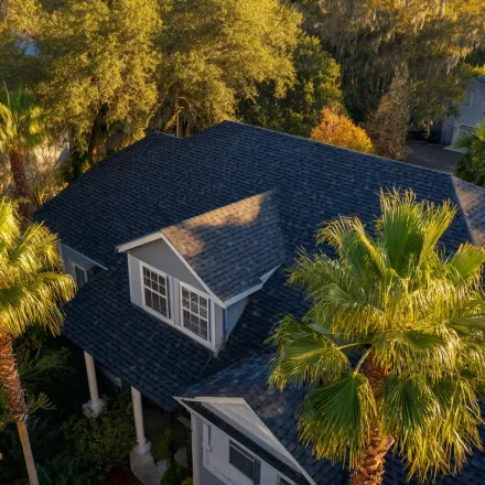 Brandon FL roofing service provider applying hydro-stop elastomeric roof coatings, tapered insulation systems, and certified weld seams for flat roof longevity.