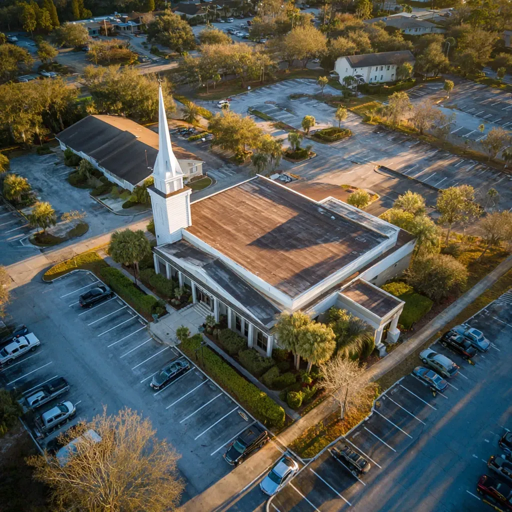 White roof system installation Brandon FL using Johns Manville 60-mil TPO with mechanically fastened seams and uplift resistance.