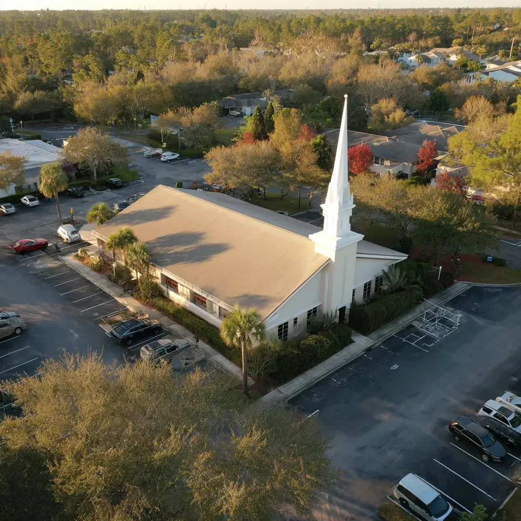 Flat roof leak sealing Brandon FL using brush-applied silicone around penetrations, scuppers, and parapet transitions.