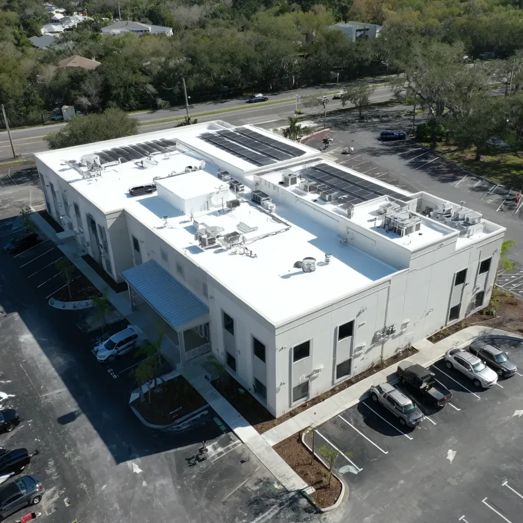 Reflective roofing contractors Brandon FL trained in TPO, PVC, and white elastomeric coatings for all commercial roof types.