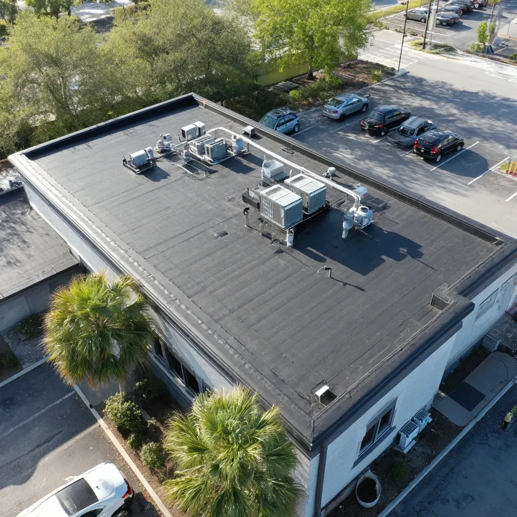 Commercial flat roof repair Brandon FL technicians sealing split TPO seams, restoring membrane integrity, and reinforcing rooftop penetration flashings.