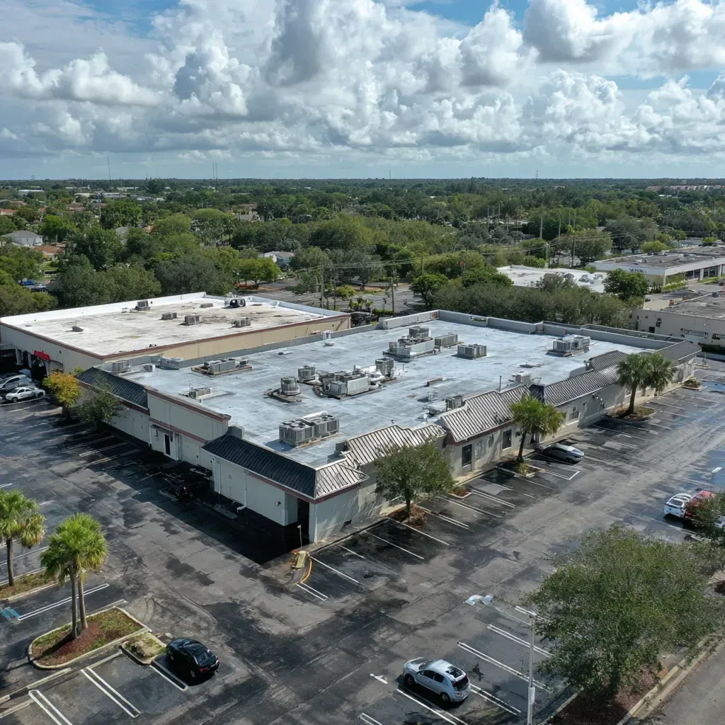Commercial flat roofing Brandon FL specialists installing mechanically fastened TPO systems with vapor barriers, walk pads, and pipe boot flashings.