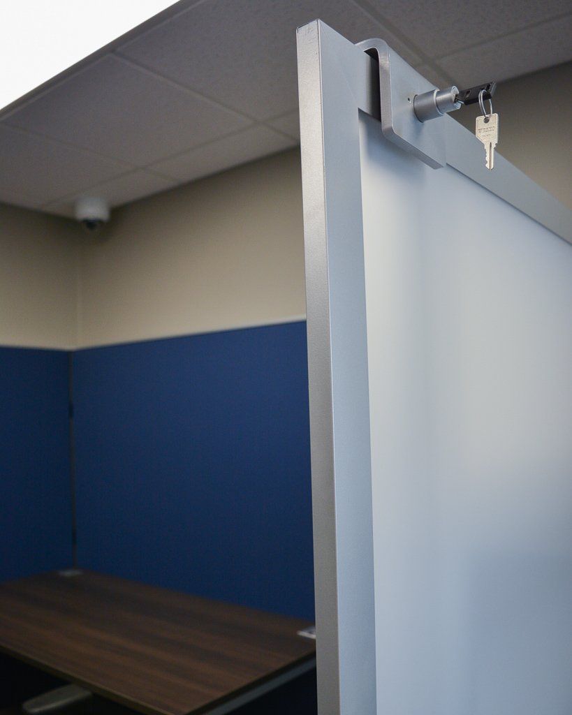 close up of sliding door on cubicle