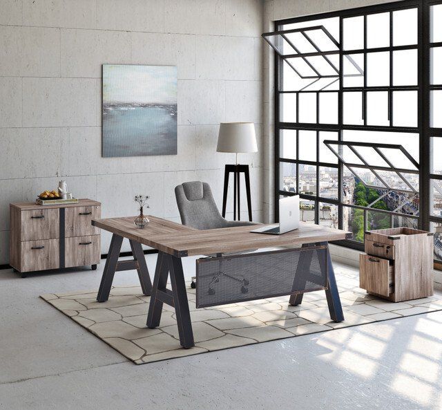 an office with a large window and a wooden desk
