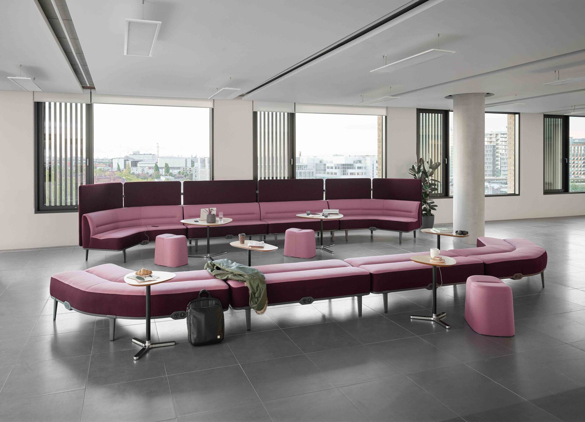 Curved purple high back & bench soft seating with small tables and stools