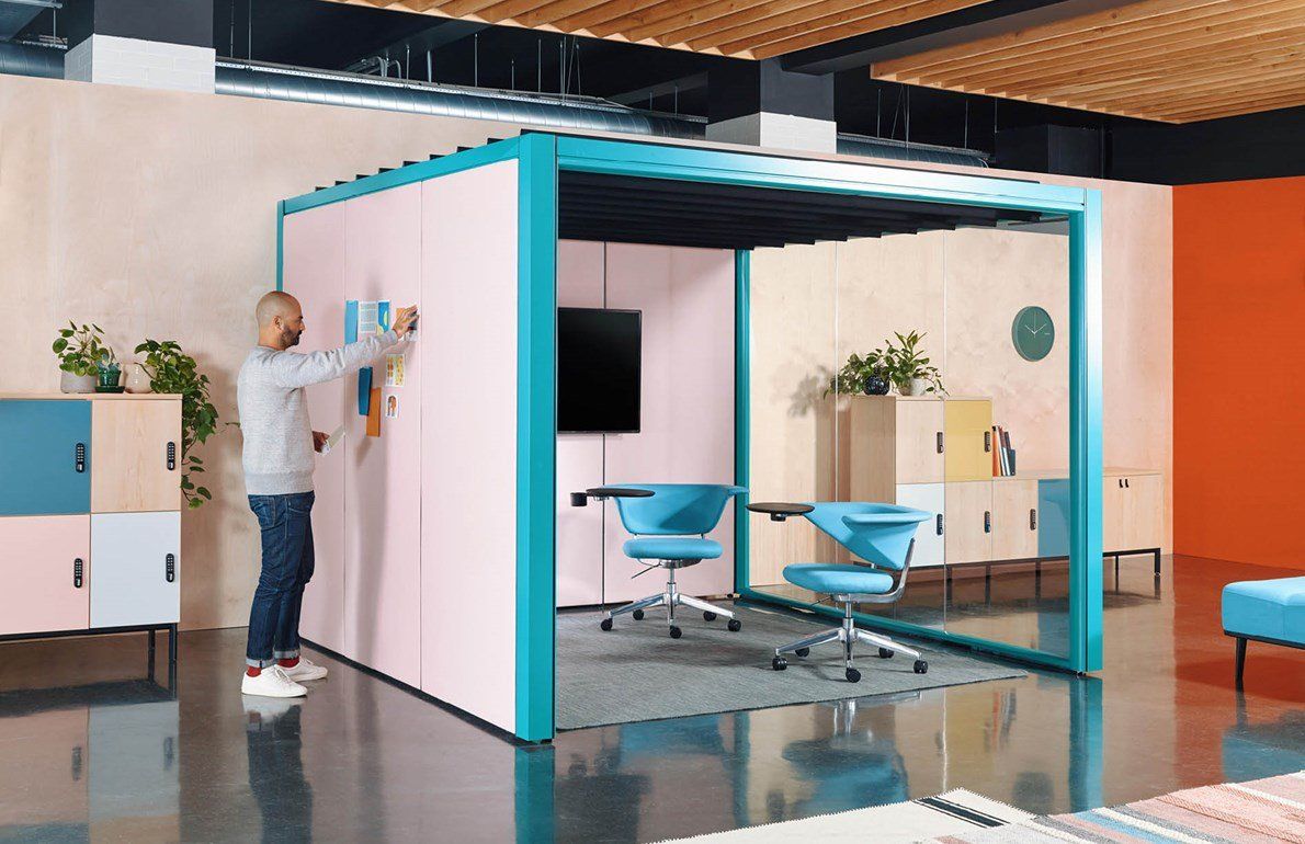 Senator pink and teal CellPod Cabana meeting space with Sholes chairs