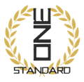 Gold laurel wreath around black vertical logo text above &ldquo;STANDARD&rdquo; on white background