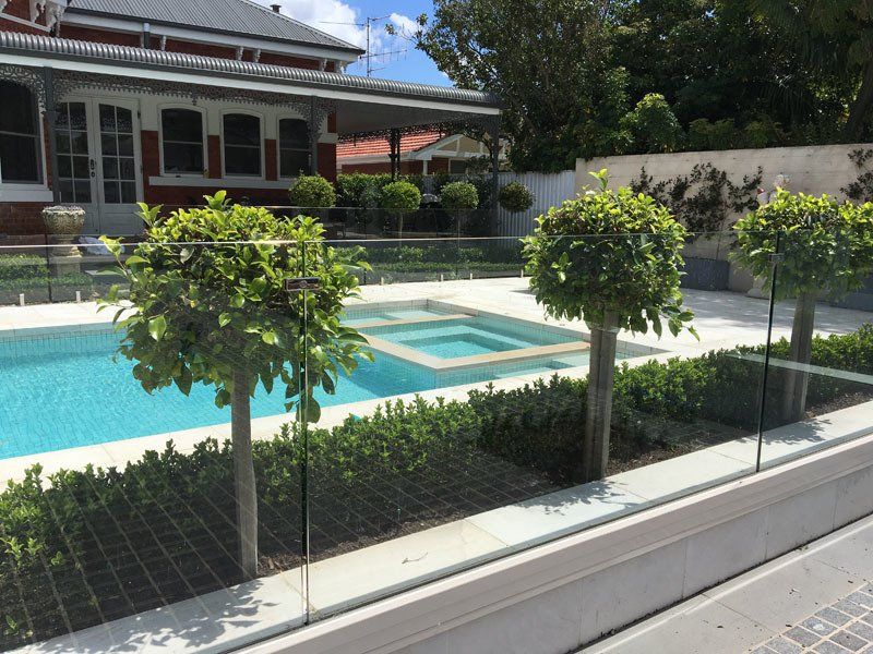 View of outdoor pool with clear water