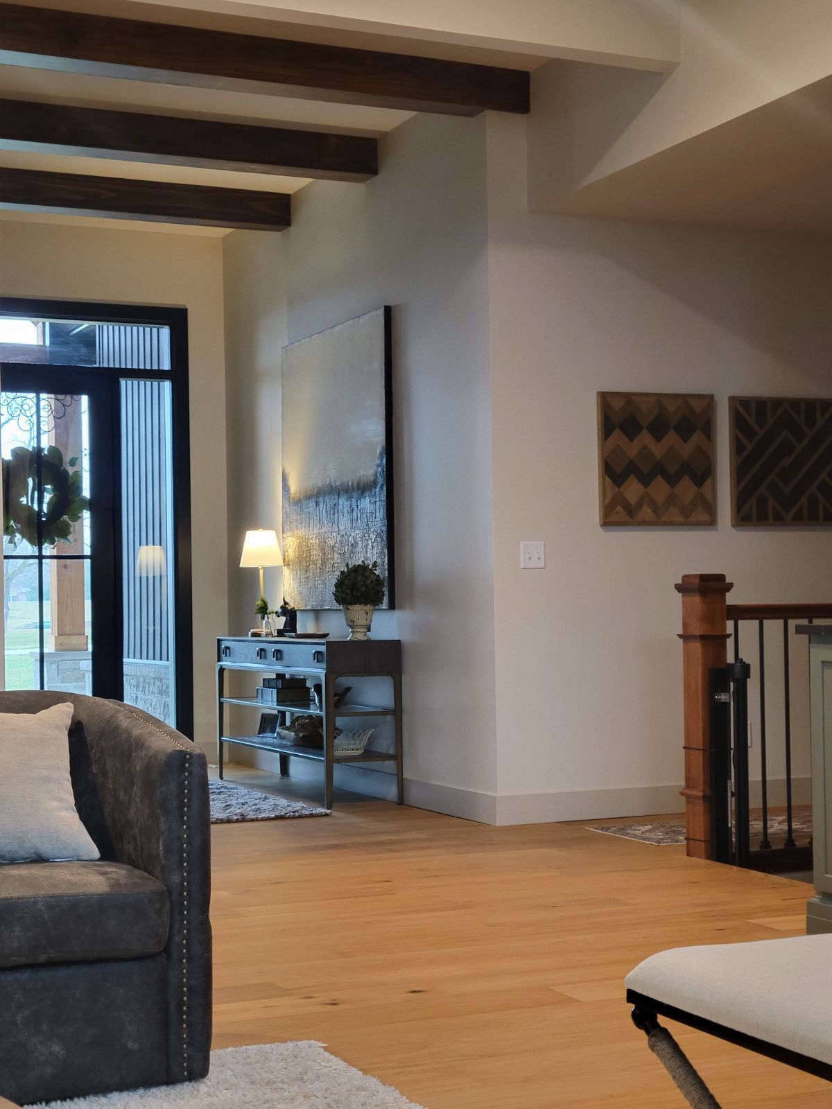A living room with a chair and a table