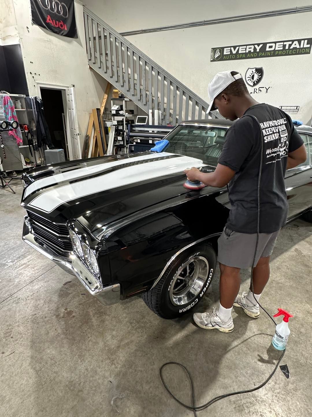 Black Porsche Carrera rear with black grill and silver lettering.