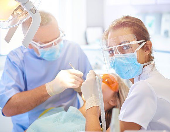 Dentist With His Assistant — Haverhill, MA — Haverhill Dental Associates Inc