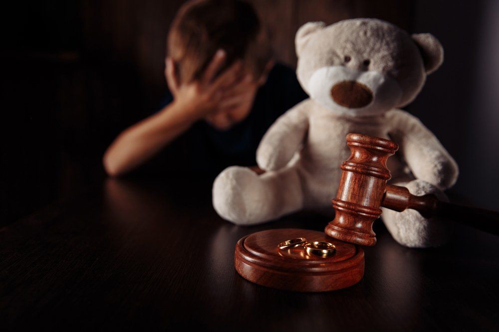 Sad Little Boy with Teddy, Divorce and Separation — Divorce Lawyer in Gladstone, QLD