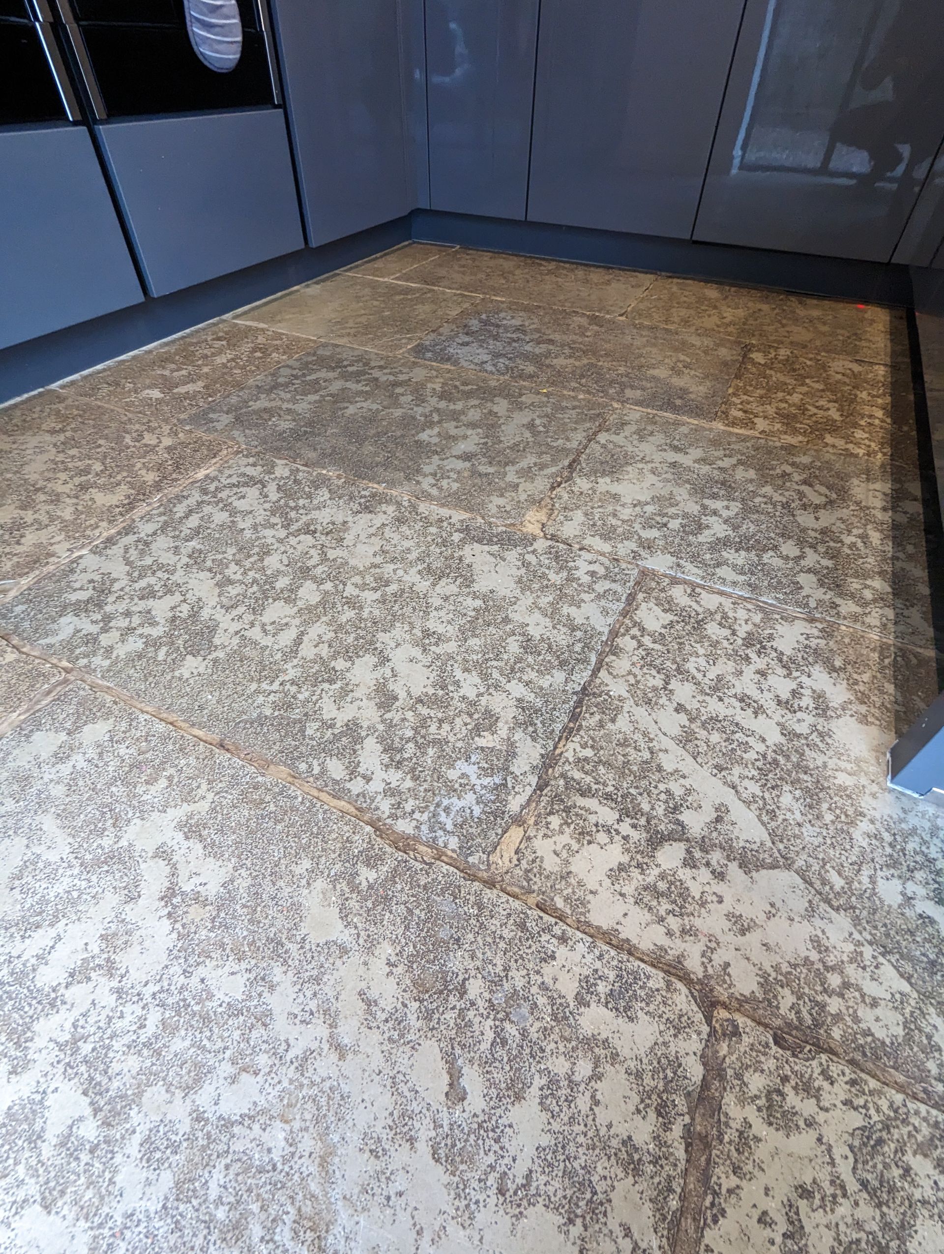 Restoring the elegance: deep cleaning and sealing a stone floor with engrained dirt in Greater Manchester