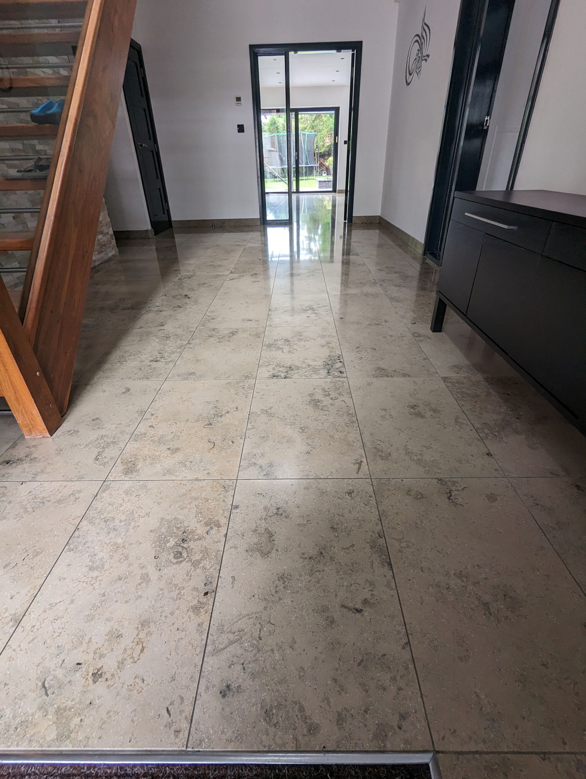 Marble floor deep cleaning, polishing, sealing and grout cleaning in Greater Manchester. Filling in holes with a resin filler.