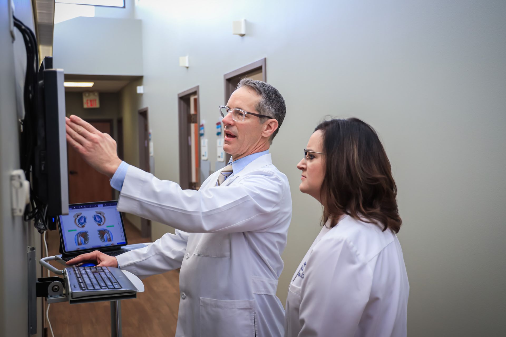 Richard Baumann, M.D. reviewing xray