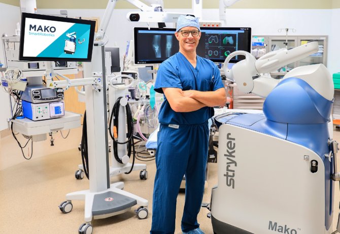 Richard Baumann, M.D.  with Mako robot