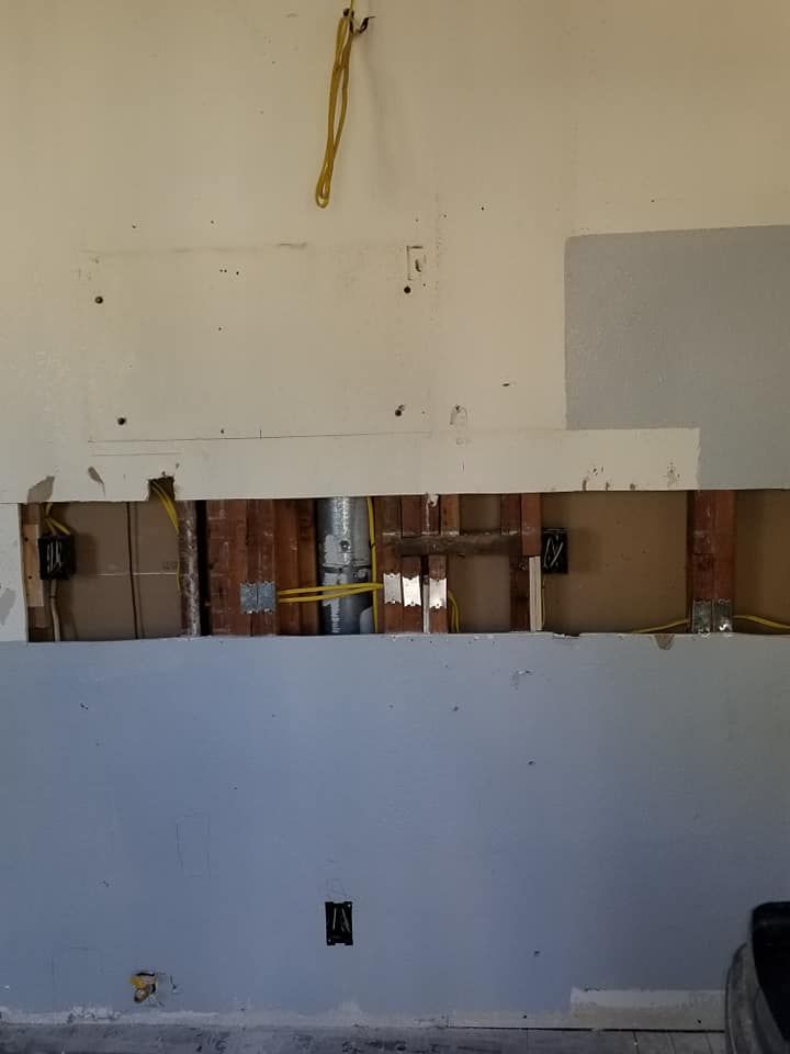 There is a hole in the wall in the middle of the room.