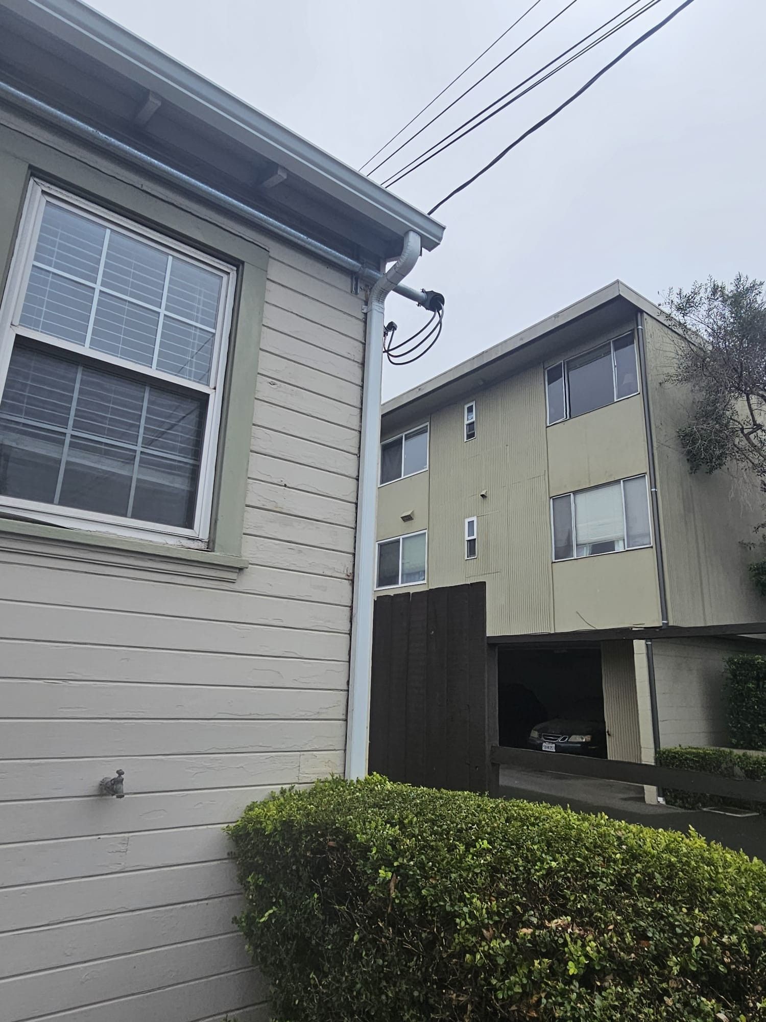 A building with a gutter on the side of it